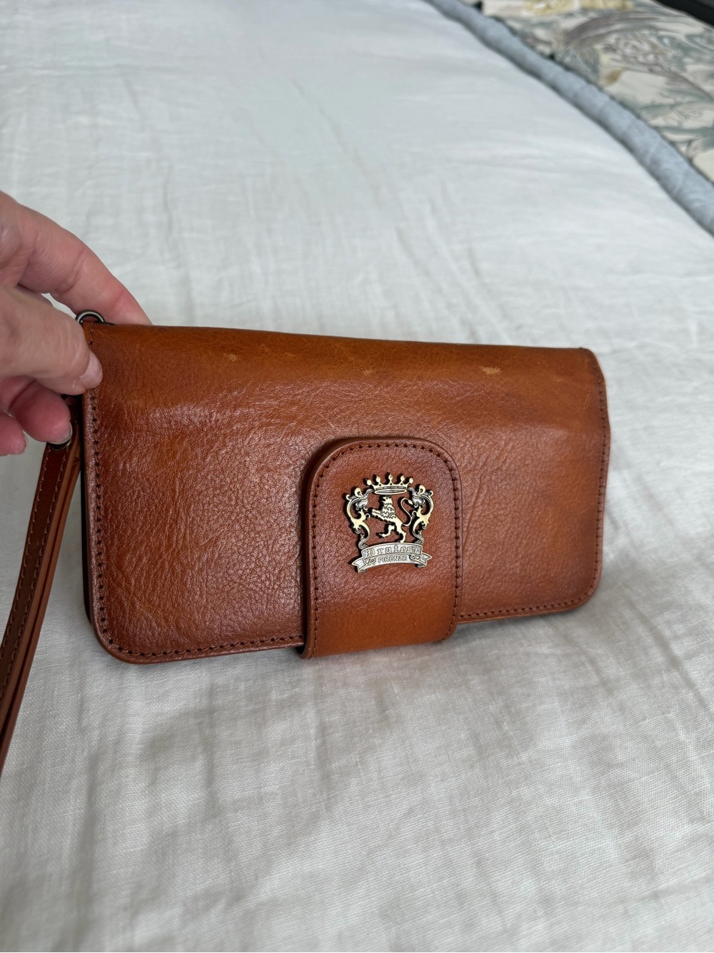 Pratesi Leather Wristlet Clutch in Cognac Brown in Excellent Condition.